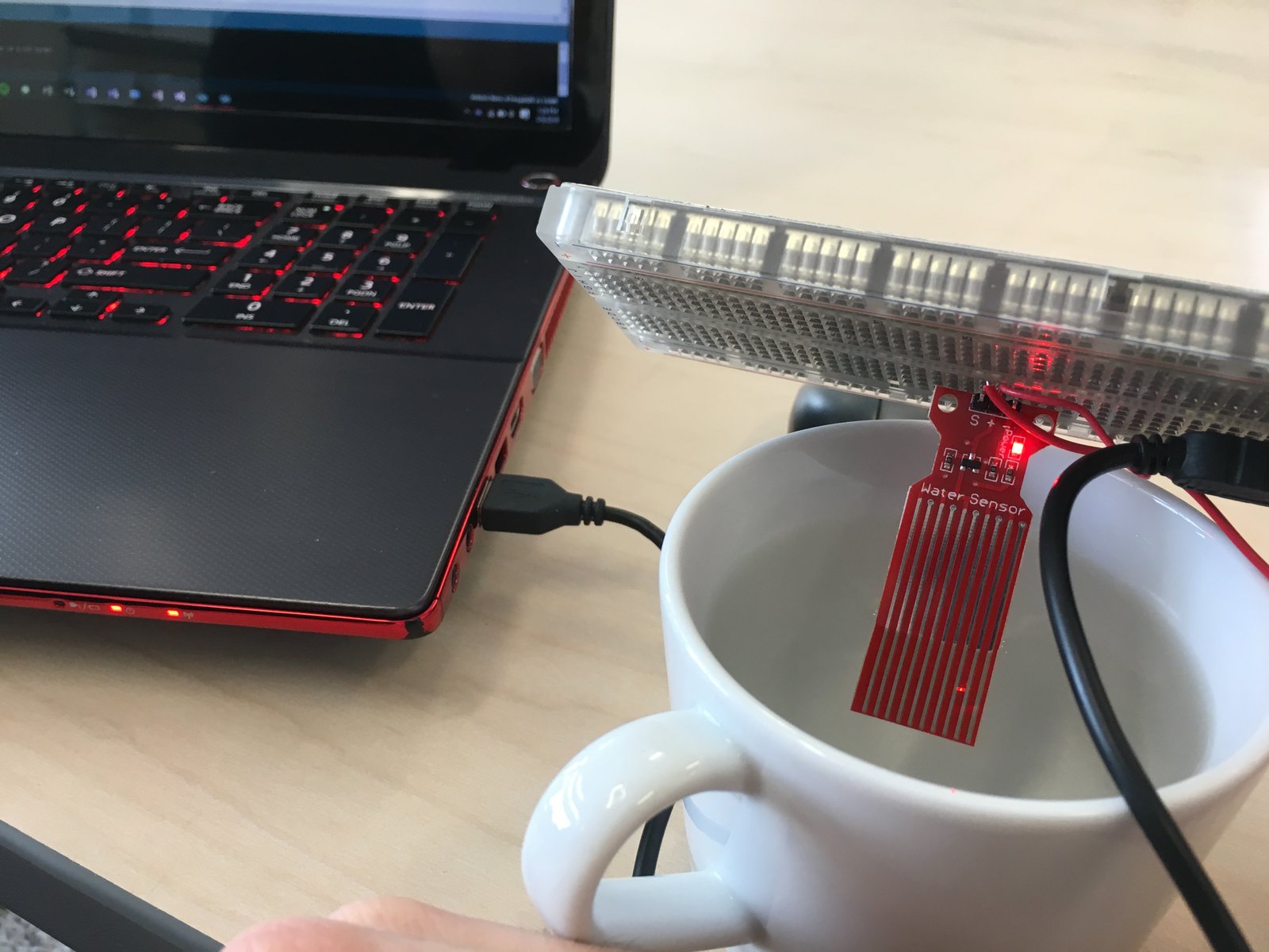  Forrest testing the level sensor's accuracy before calibrating it. 