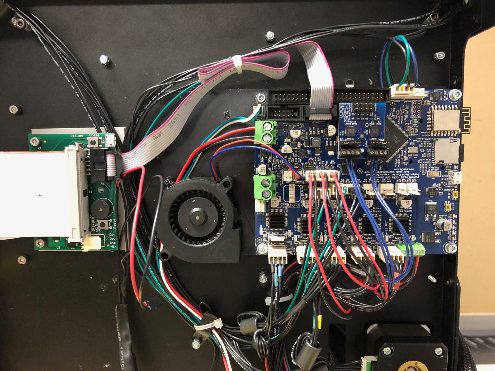 The 'belly of the beast', as it were. The Duet 2 controller uses a wi-fi card and a web-based UI to handle everything from remote control, downloading print jobs, programming and debugging. 