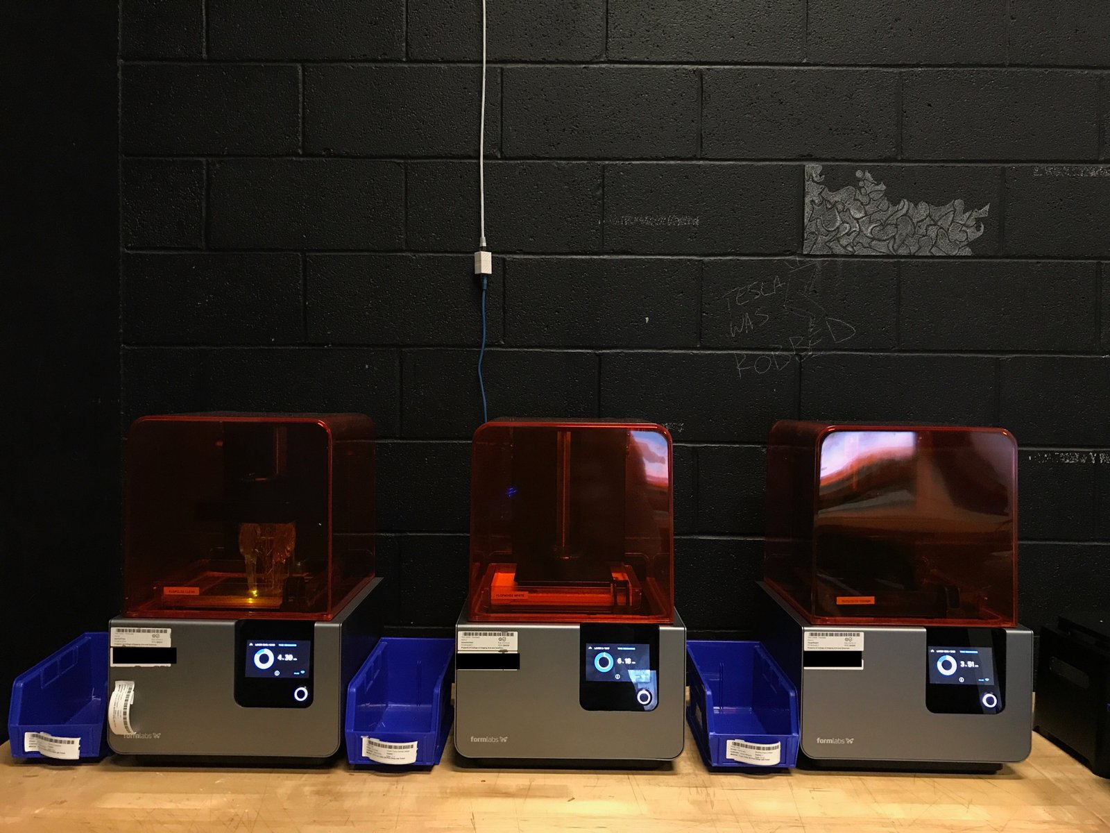 Our first three Form 2 SLA printers, of which we still use today. 
